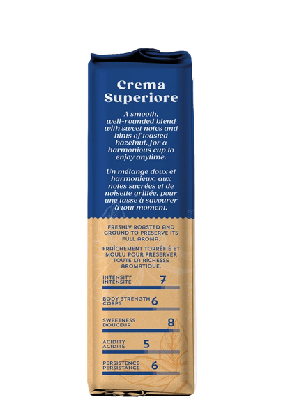 A tall, narrow cream-colored pouch of Creme Superiore coffee with a dark blue top section and white text, shown on a plain white background.